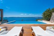 Luxurious beachfront villa Hrid with with Jacuzzi, infinity pool
