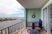 Waterfront condo with bay views pool hot tub boat ramp & private balcony