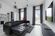 Stylish Apartment Near PGE Narodowy in Warsaw by Noclegi Renters