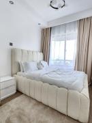 Beautifully furnished apartment with swimming pool ample parking space fully equipped gym child play area and amazing city views