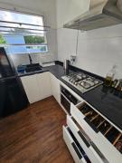 Apartamento con gran balcón frente a parque