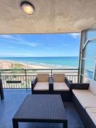 First-Line Beachfront Penthouse, Terrace, and Ocean Views