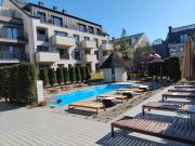 Apartamentai su baseinu