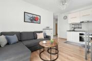 Cozy & Functional Apartment with Parking and Balcony by Noclegi Renters