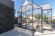 Rooftop Glasshouse Retreat by LovelyStay