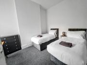 Elegant 4-Bedroom City Centre Stay with Free Parking, High-Speed Wi-Fi & Pool Table Close to MKM Stadium