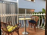 Colorful flat with bell-shaped balcony