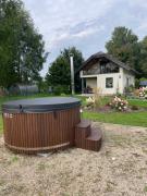 Laukakmeņu oāze - holiday house with sauna and hot tub