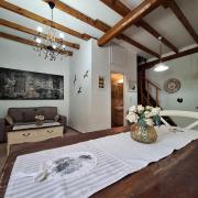 Casa di Sofiana by wood and stone