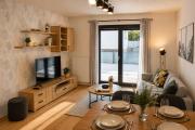ENJOYHARRACHOV Atraktivní klidné studio 3 v centru Harrachova s parkováním, velkou terasou, Wifi-WLAN, SAT zdarma, možností dobíjení auta, výhledem do zahrady a na romantický kostelík jen 150m od lanovky