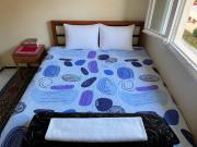 Cozy private room for couples - hosted home -not an entire apartment- Walk to Bus Station & Easy Medina Access