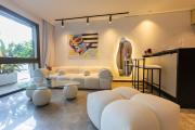 Modern Seaside Apartment with Pool & Parking