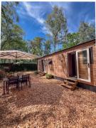 Atara Abode - Chalet voor 4 personen bij De Hoge Veluwe met tuin