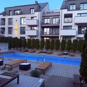 Apartamentai prie baseino