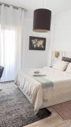 Quarto com casa de banho privativo