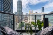 Modern Downtown Studio with Balcony & City Views