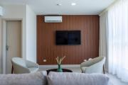 One-Bedroom Apartment with Coastal and City Views