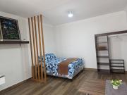 Room in a residential complex across from the airport