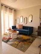 Cozy airport stay with gym and workspace