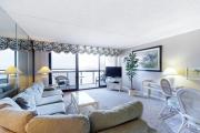 Sunny beachfront condo with balcony central AC pools & gym