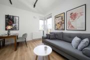 Stylish Apartment with Balcony and Underground Parking by Noclegi Renters