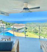 Ocean-View Condo with Infinity Pool Sunset Escape