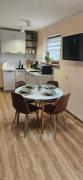 Apartament pod laskiem