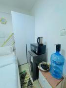 Budget friendly compact studio SQ in westlands With queen size bed fridge tv microwave pool but no cooking