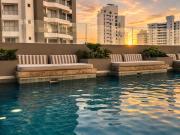 Modern studio with balcony, pool & coworking space