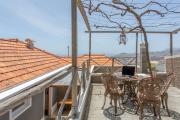 Above Funchal · A Hillside Home