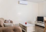 Quiet City Stay with Private Garage and 5 Min to Center