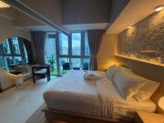 BRAND NEW unit in Uptown BGC with Balcony 55 Inch smart TV and 300Mbps WiFi, with Workspace, Beside Landers, near Uptown Mall and Mitsukoshi Mall
