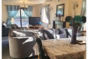 Wooden Lodge Sleeps 9 with Veranda & Decking