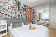 Comfortable Apartment with Air Conditioning and Balcony by Noclegi Renters