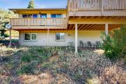 Enjoy Nature from this Charming Cabin with Deck, Fireplace, & Washer and Dryer