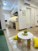 2BR Condo with Full Kitchen, Balcony and Wi-Fi in QC