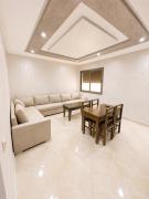 Quiet 2-bedroom with patio, elevator & parking