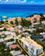 Modern 2BR Beachside Haven Ground Floor and Pool