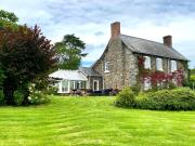 Mid-Wales Farmhouse, swimming pool, tranquil countryside views, sleeps 14