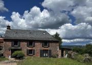 La jolie maison en grès rouge