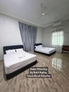 Top Tanah Merah