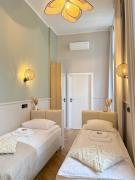 Upscale Apartments - AC in rooms, ensuite bathrooms, lift - 8 mins to Main Square