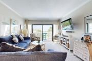 Snowbird-friendly condo with beach views private beach heated pool
