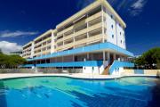 Enjoy our colourful flat with side sea view