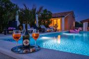 Holiday House Nives with pool and playground