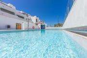 2BR Apt with Terrace & Parking, Near Beach & Town