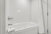 Luxurious King Suite 364 in Bay Harbor, perfect for couples, with stunning village views.