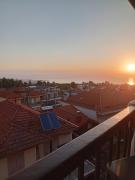 Olympian sunrise balcony