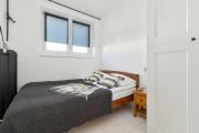 Przytulny Apartament w Dobrej Lokalizacji by Noclegi Renters