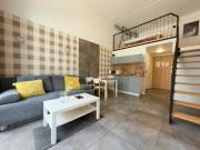Wrocław Airport Apartment with Mezzanine by BookingHost